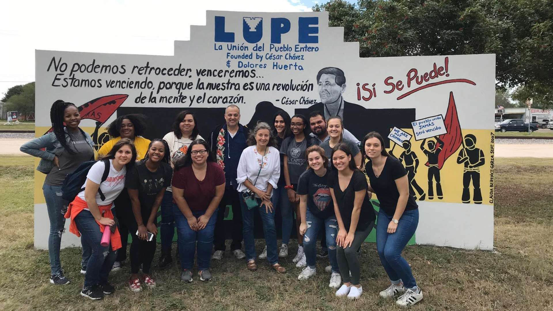 Students stand in front of LUPE, a community activist organization in the Rio Grande Valley founded by Cesar Chavez and Dolores Huerta