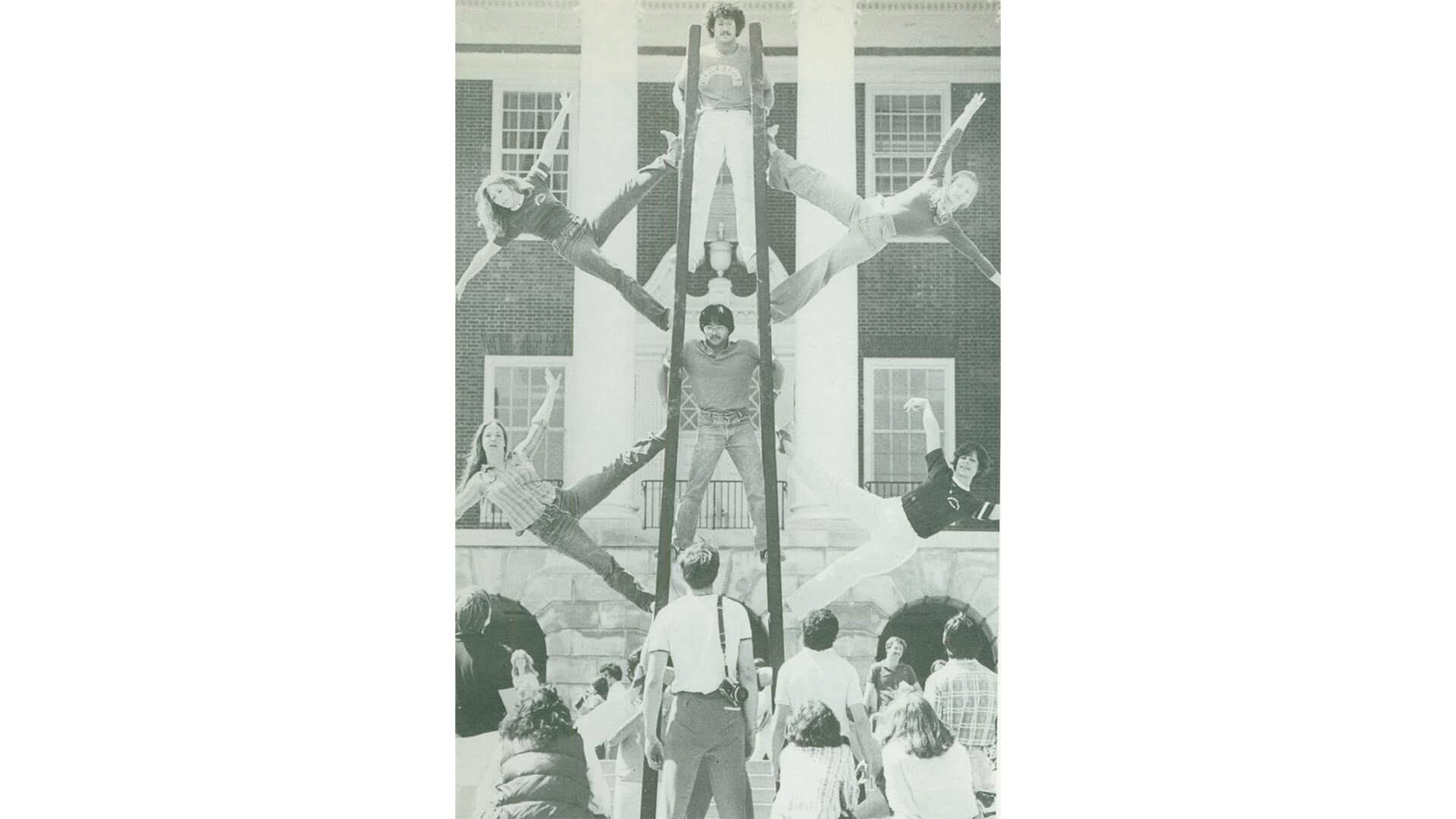 Gymkana members perform on stilts on McKeldin Mall