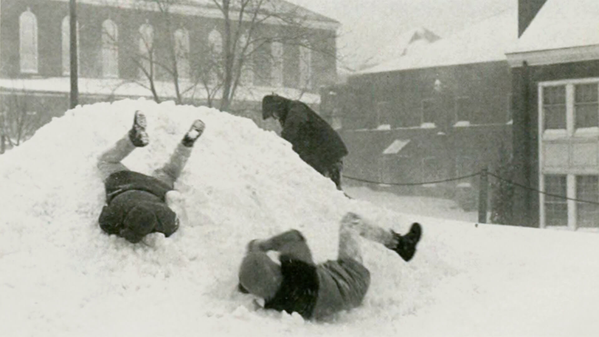 Students in a pile of snow in 1996