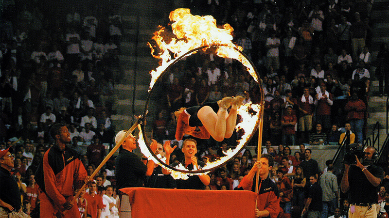 Gymkana member leaps through hoop of fire