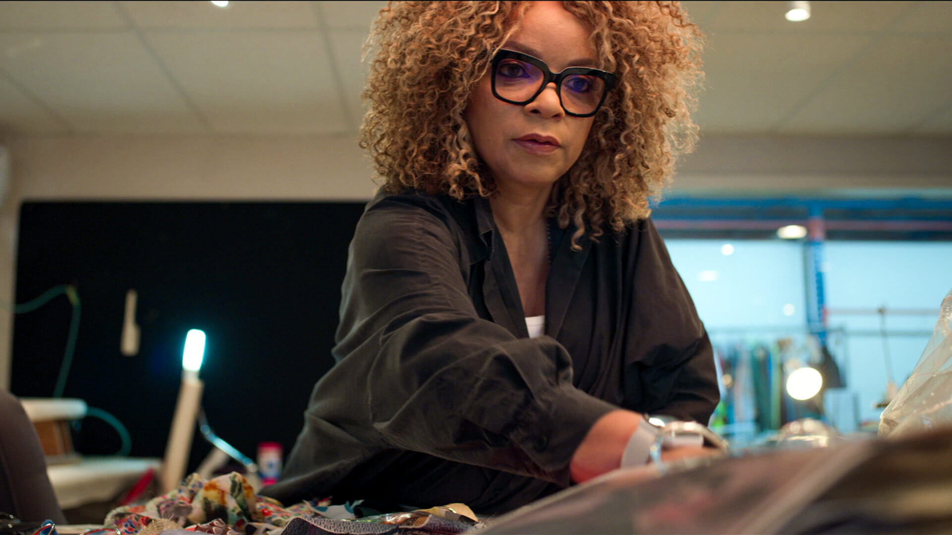Ruth E. Carter works on costumes