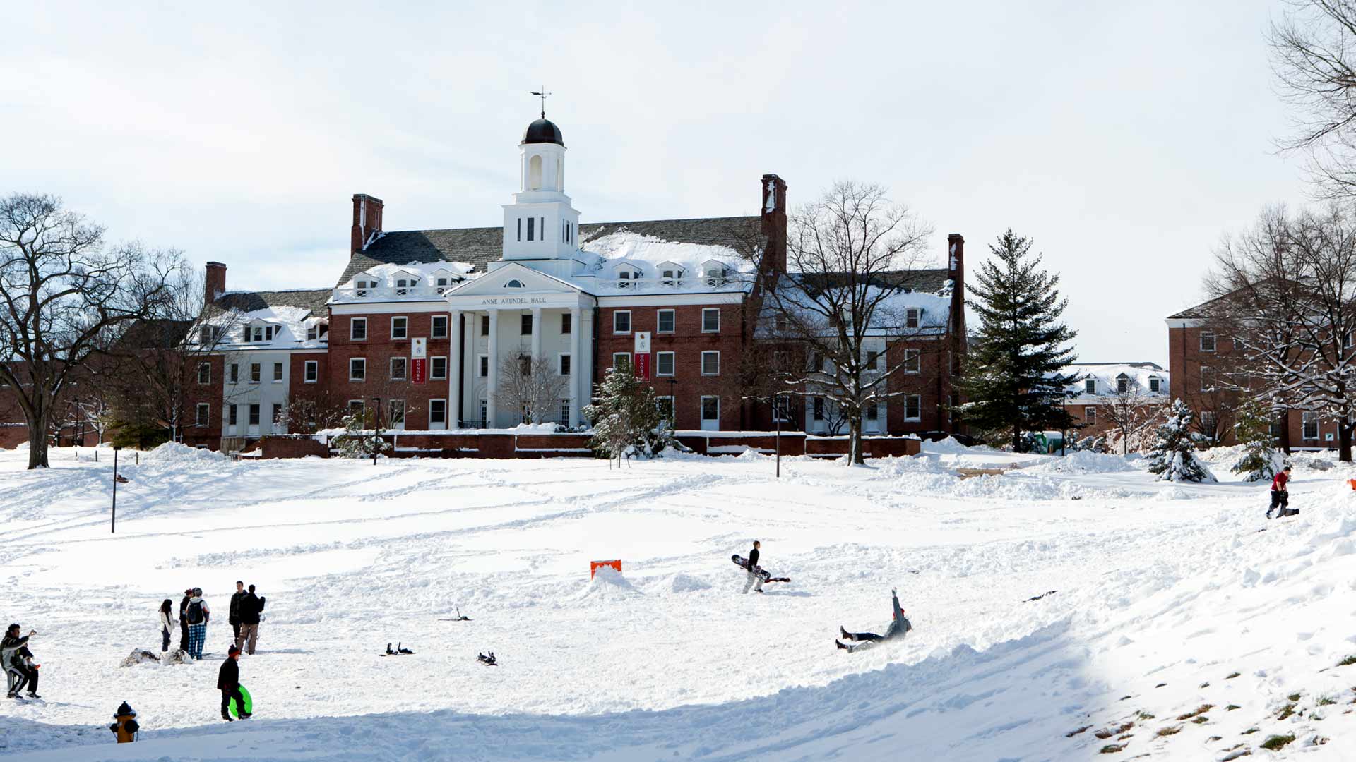 Students sledding on campus in 2010