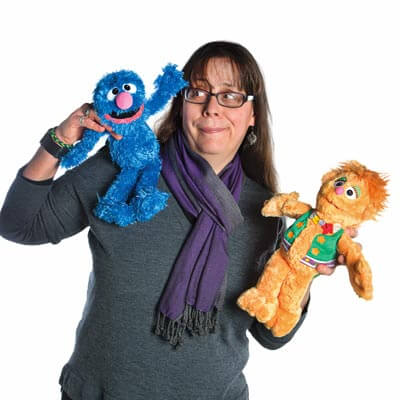 Dina Borzekowski with muppets