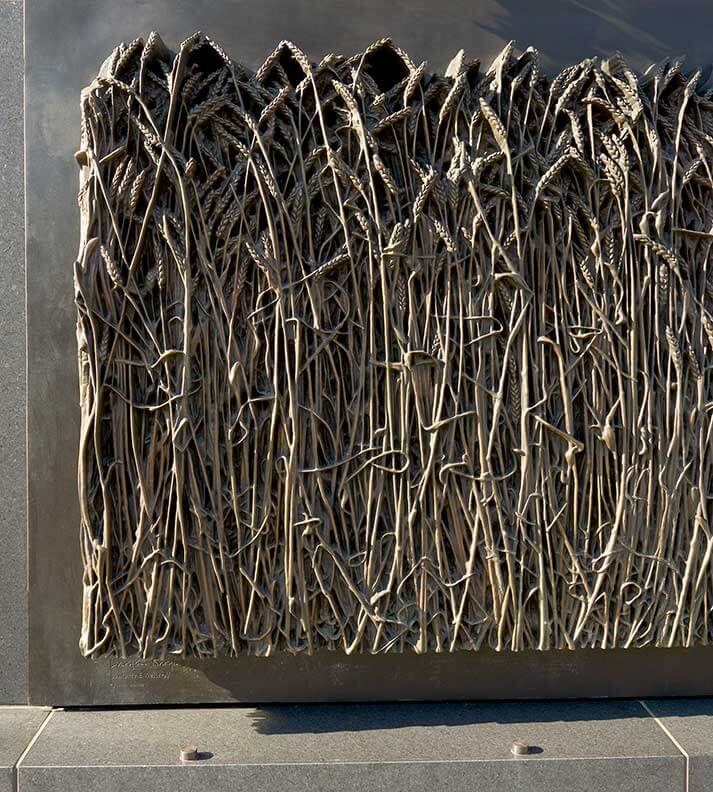 Closeup of the stalks of wheat on the Holodomor memorial