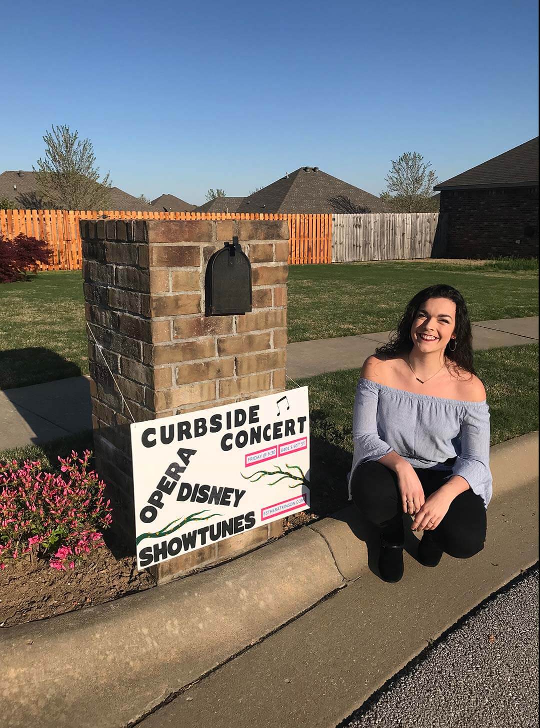 Esther Atkinson crouches by side that reads, "Curbside concert. Opera, Disney, showtunes."
