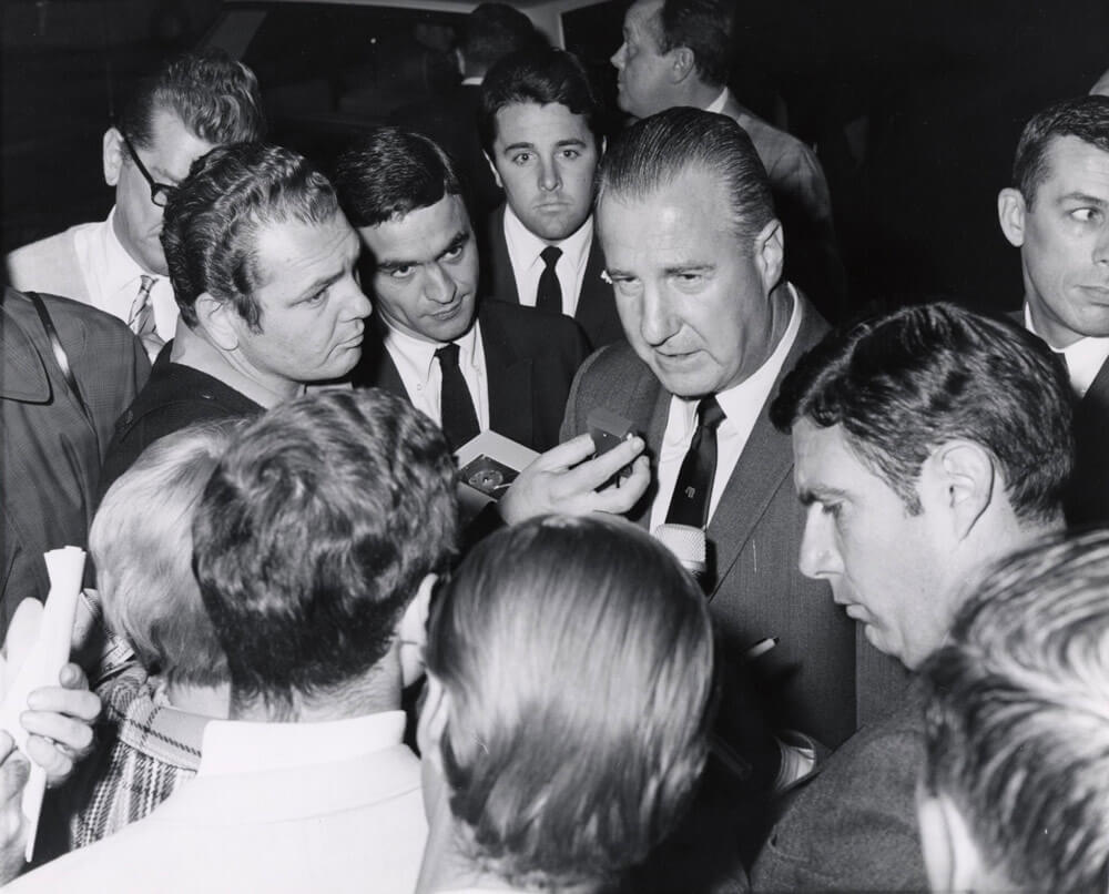 Spiro Agnew surrounded by crowd of people