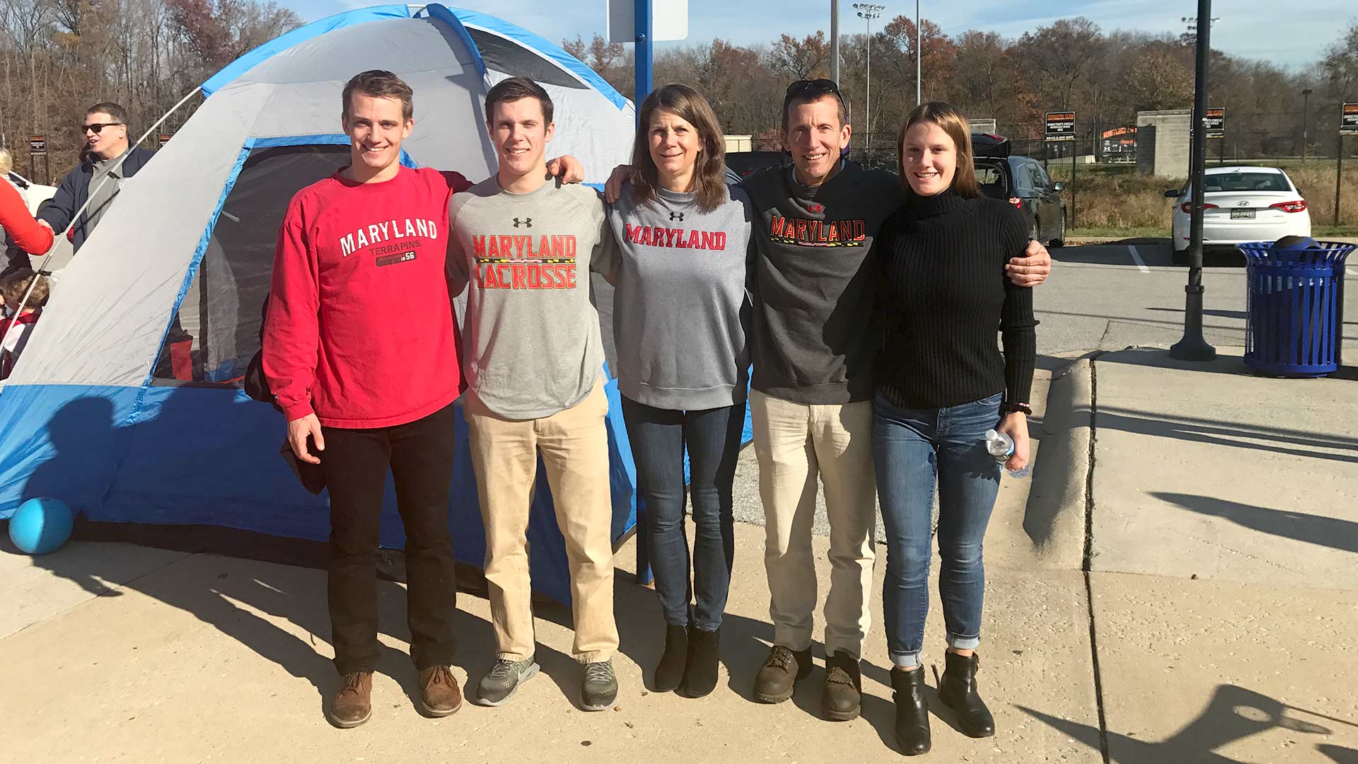 Dr. Kathleen Neuzil ’83 and family tailgating at UMD game